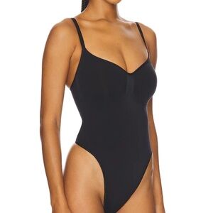 SKIMS Seamless Sculpt Thong Bodysuit in Onyx